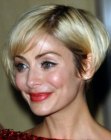 Natalie Imbruglia sporting a very short bob with a shorter back section