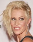 Natasha Bedingfield rocking a short asymmetric hairstyle with layers