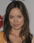 Olivia Wilde wearing her brown hair long and below her shoulders