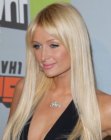 Paris Hilton wearing hair extensions that were straightened with a flat iron