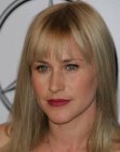 Patricia Arquette's long and shiny blonde hair with bangs