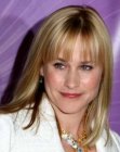Patricia Arquette's long and shiny blunt cut hair with bangs