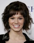 Rachel Melvin with short chin length layered hair and bangs