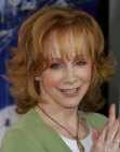 Reba McEntire wearing her medium long hair with flipped out ends