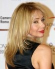 Rosanna Arquette wearing her hair long with layers and angled sides