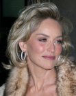 Sharon Stone with medium length hair in a simple style