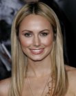 Stacy Keibler with her blonde hair cut into a simple long style