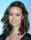 Summer Glau's soft hairstyle with curls and an irregular part
