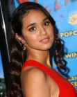 Summer Bishil wearing her dark very long with spiral curls