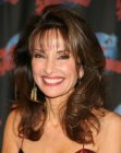 Susan Lucci's long hairstyle with layers and curls
