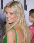 Tara Reid wearing her long middle of the back hair with a center part