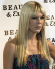 Tinsley Mortimer sporting long sleek hair that flows below the shoulders