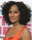 Tracee Ellis Ross wearing her almost shoulder length hair with layers and curls