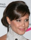 Vanessa Minnillo with her hair pulled back into an updo