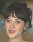 Zoey Deschanel with her hair styled up