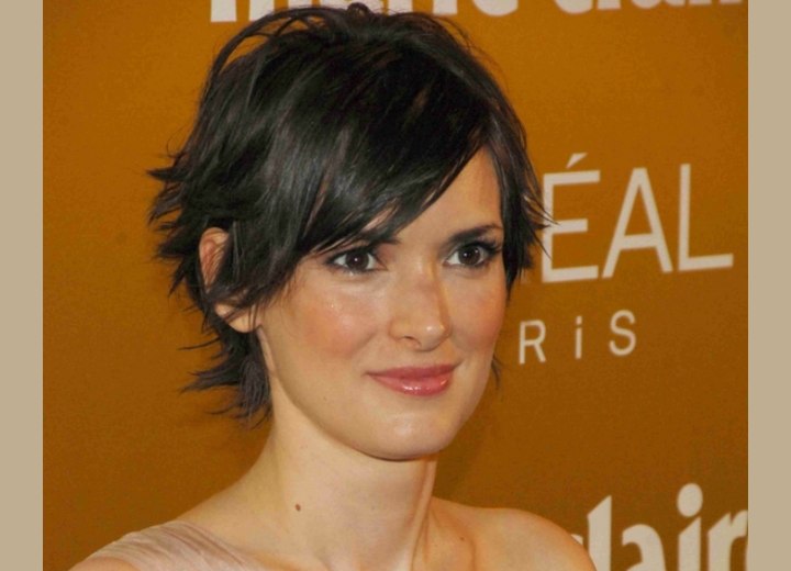 Winona Ryder - Choppy short hairstyle for a long neckline