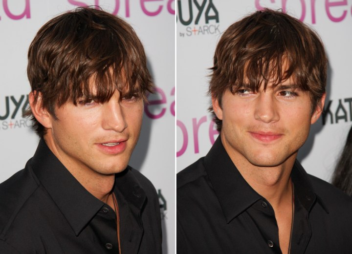 Ashton Kutcher's hairstyle with hair that falls over his ears