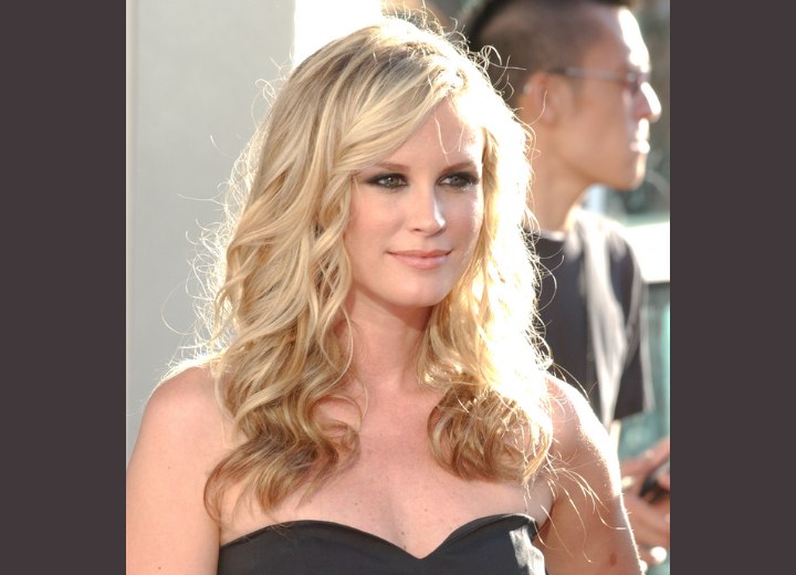 Bonnie Somerville with her long blonde hair combed over to the side