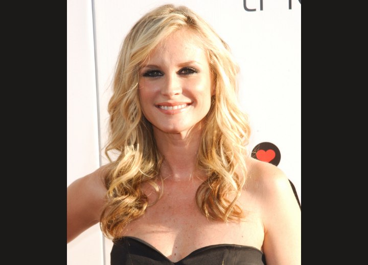 Bonnie Somerville's long blonde hair with curls