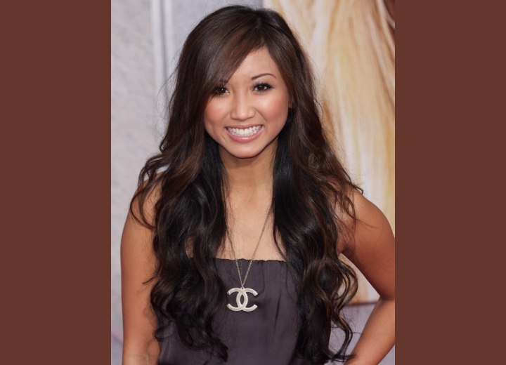 Brenda Song with super long wavy hair