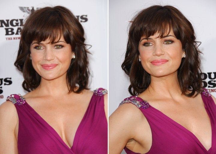 Carla Gugino - Medium long hairstyle with curls and bangs