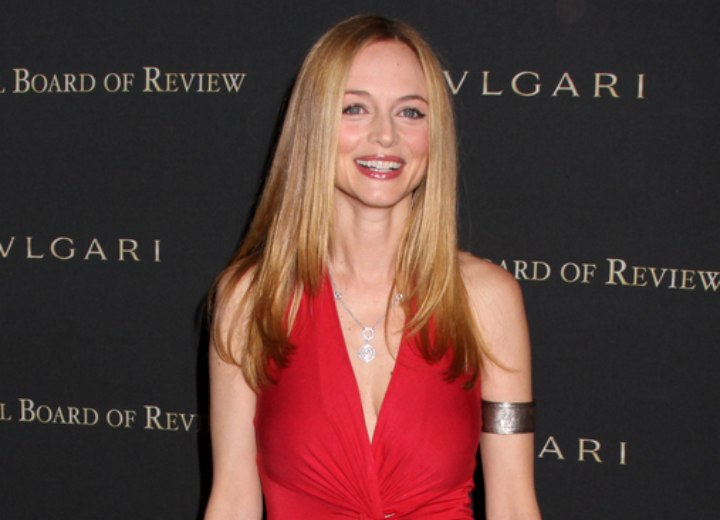 Heather Graham wearing a red dress