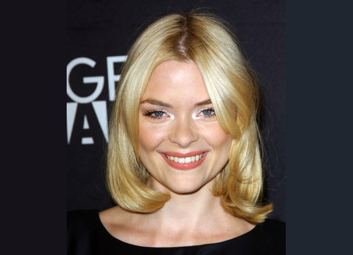 Jaime King's medium length hairstyle with side bangs