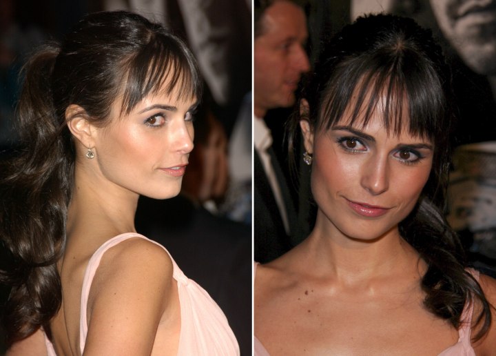 Jordana Brewster with her hair in a curled ponytail