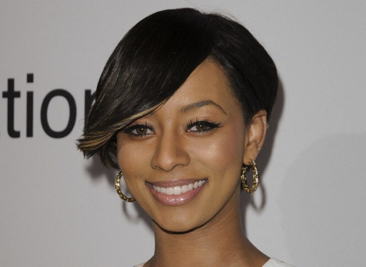 Keri Hilson's short haircut with hair combed over her ear