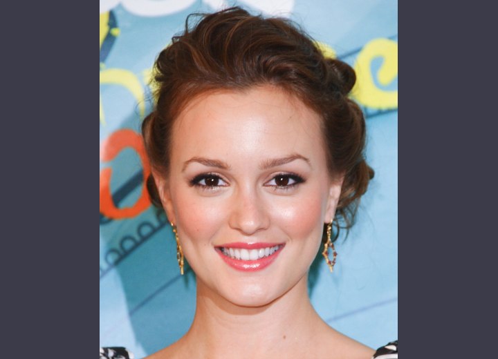 Leighton Meester wearing her hair in a curly updo
