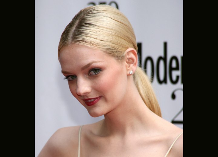 Lydia Hearst wearing her blonde hair in a ponytail