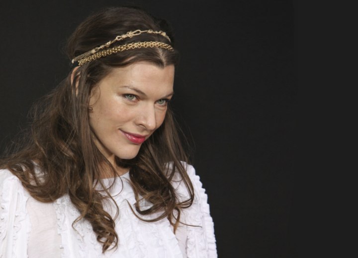 Milla Jovovich wearing an old days of England hairstyle