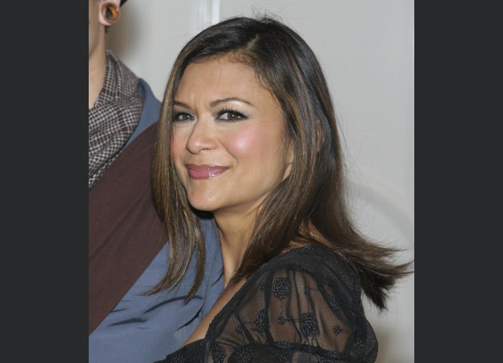 Nia Peeples's long brown hair with highlights