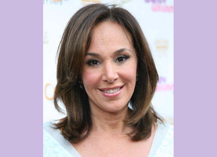 Rosanna Scotto with highlighted brown hair that curls under her chin