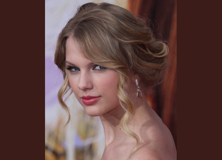 Side view of Taylor Swift's up-style