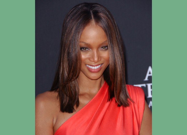 Tyra Banks with long smooth hair