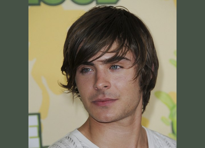 Zack Efron wearing his hair in a roughed up shag