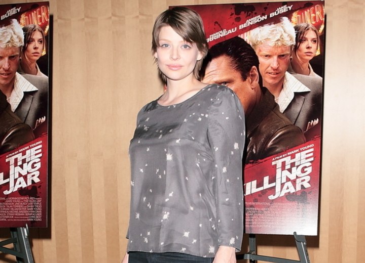 Amber Benson wearing a gray silk top