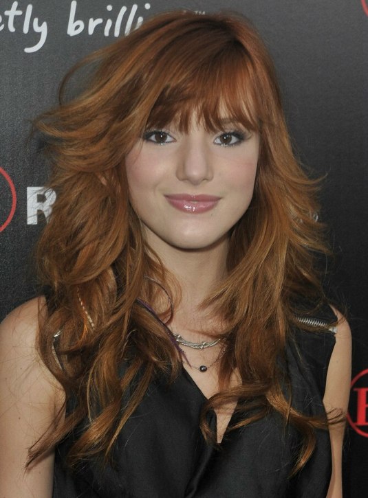 Bella Thorne sporting a long razor cut hairstyle