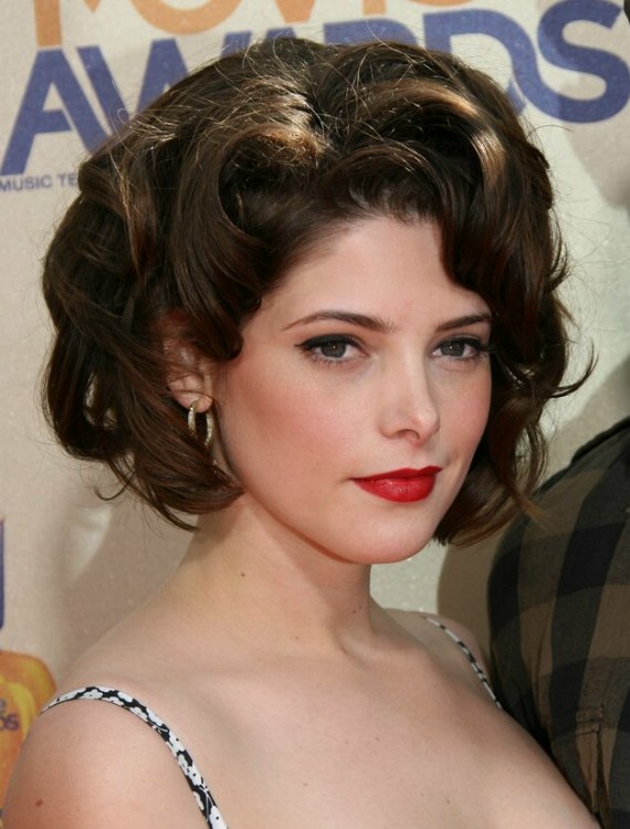 Ashley Greene with shorter hair half way down the neckline 