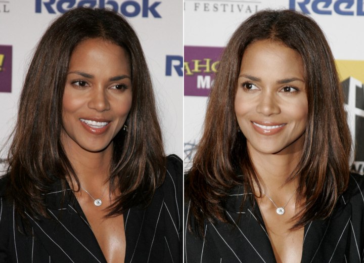 Halle Berry sporting a long straight hairstyle with movement Halle Berry sporting a long straight hairstyle with movement