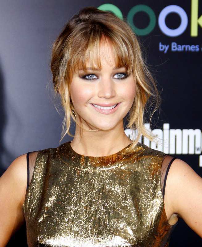 Jennifer Lawrence  Up-style with a woven chignon and 