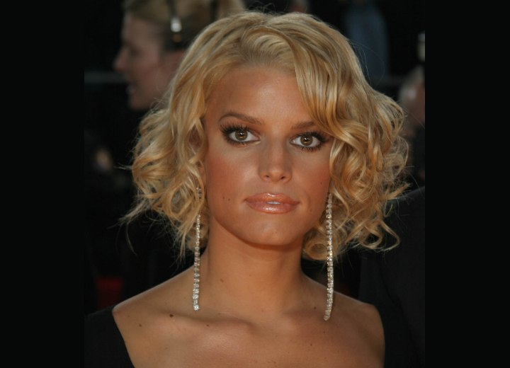 Jessica Simpson with short curled hair