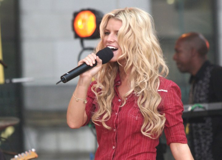 Jessica Simpson wearing a shirt and shorts