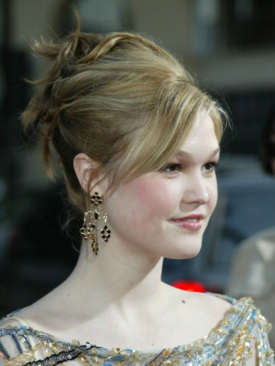Julia Stiles sporting a princess look with her hair styled 