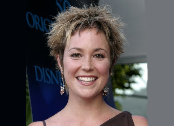 Kim Rhodes with short chopped hair