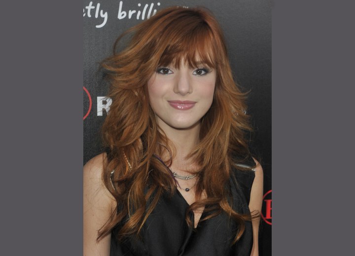 Bella Thorne with a long razor cut hairstyle