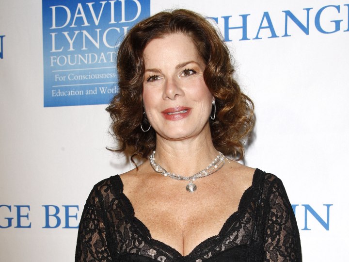 Marcia Gay Harden - Medium length curly hairstyle