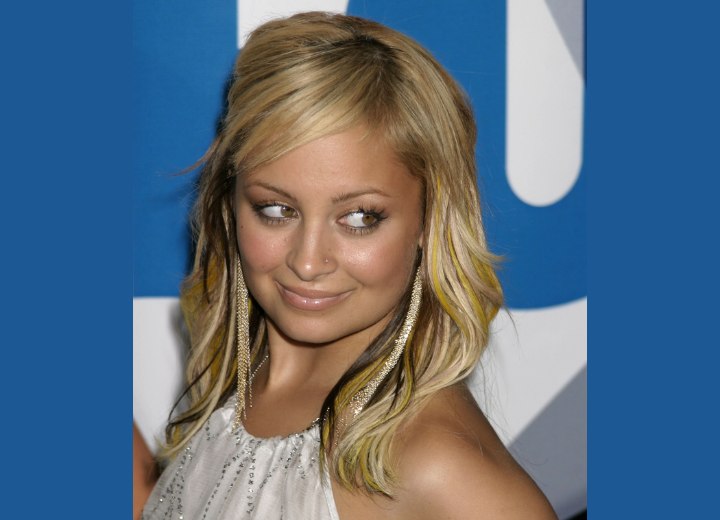Nicole Richie with hair just below the shoulders