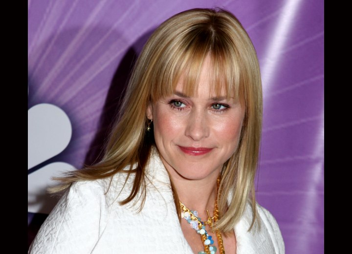 Patricia Arquette with satiny smooth hair cut in a long Patricia Arquette with satiny smooth hair cut in a long